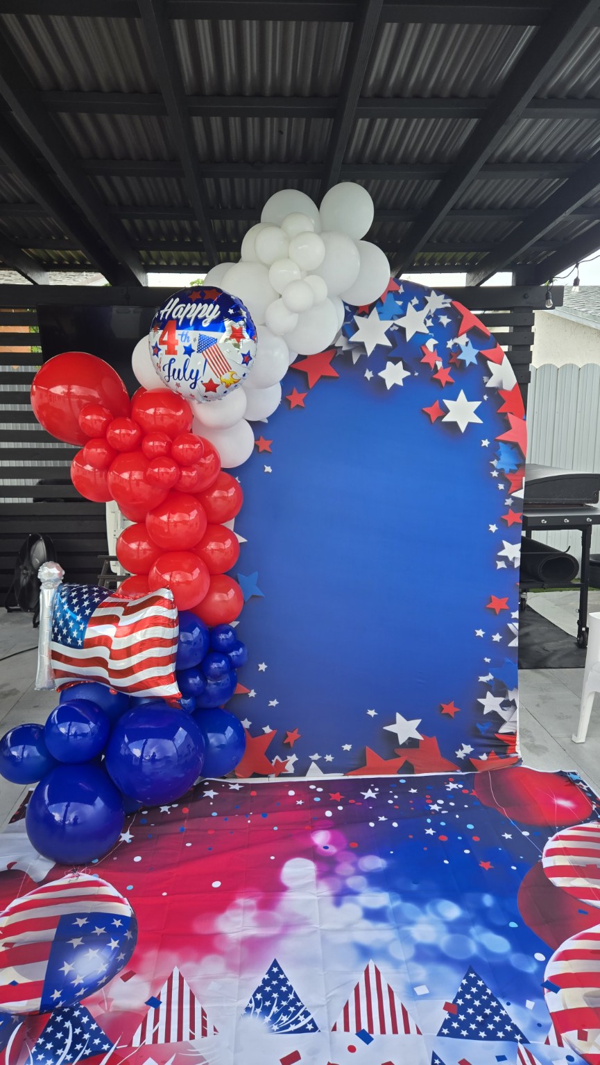 Red white and blue Fourth of July balloon backdrop in Port St. Lucie by AABallons